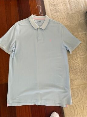 Izod Men’s Pale Blue Polo with Pink Logo